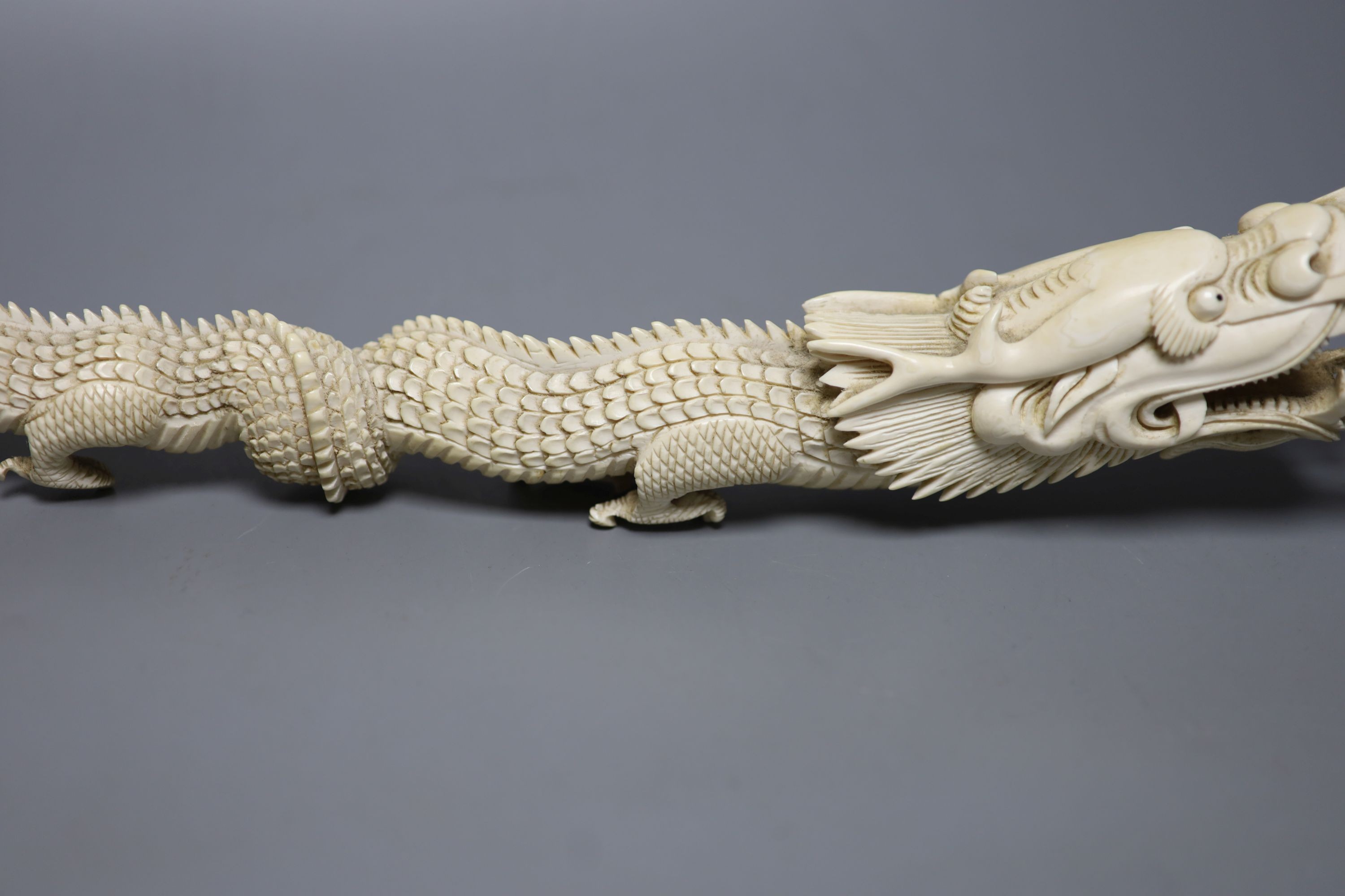 An Indonesian ivory carving of a dragon, first half of 20th century 52cm, , An Indonesian ivory carving of a dragon, first half of 20th century